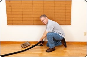 air duct technician working