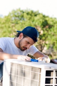 Appliance repair technician working