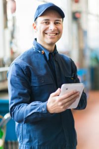 window cleaning employee using mobile app 